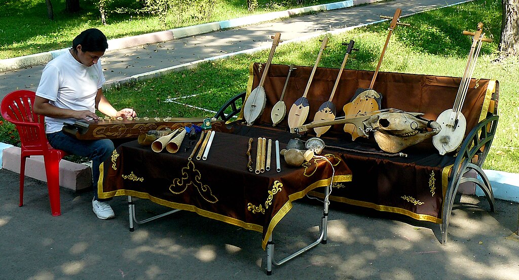 A vendor selling musical instruments rural part of the Russian Republic of Khakassia.